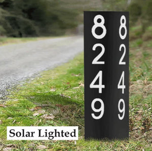 Image of our Double Sided 35-Inch Lighted Modern Steel Address Sign. A stunning steel address sign with custom rust patterns, high-performance solar spotlight, and magnetic numbers. Choose between Rusted Patina with Black Numbers or Black Sign with Silver Numbers. Enhance your home's curb appeal, day and night. Caution: Includes rare earth magnets.